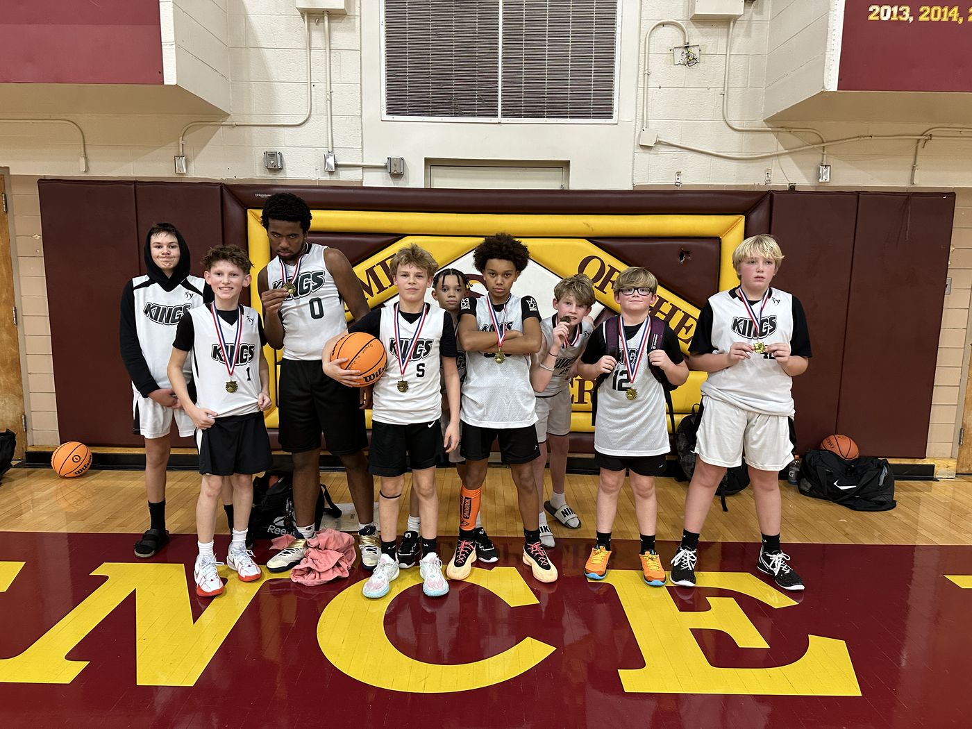 Kings team lined up on the court before a game.