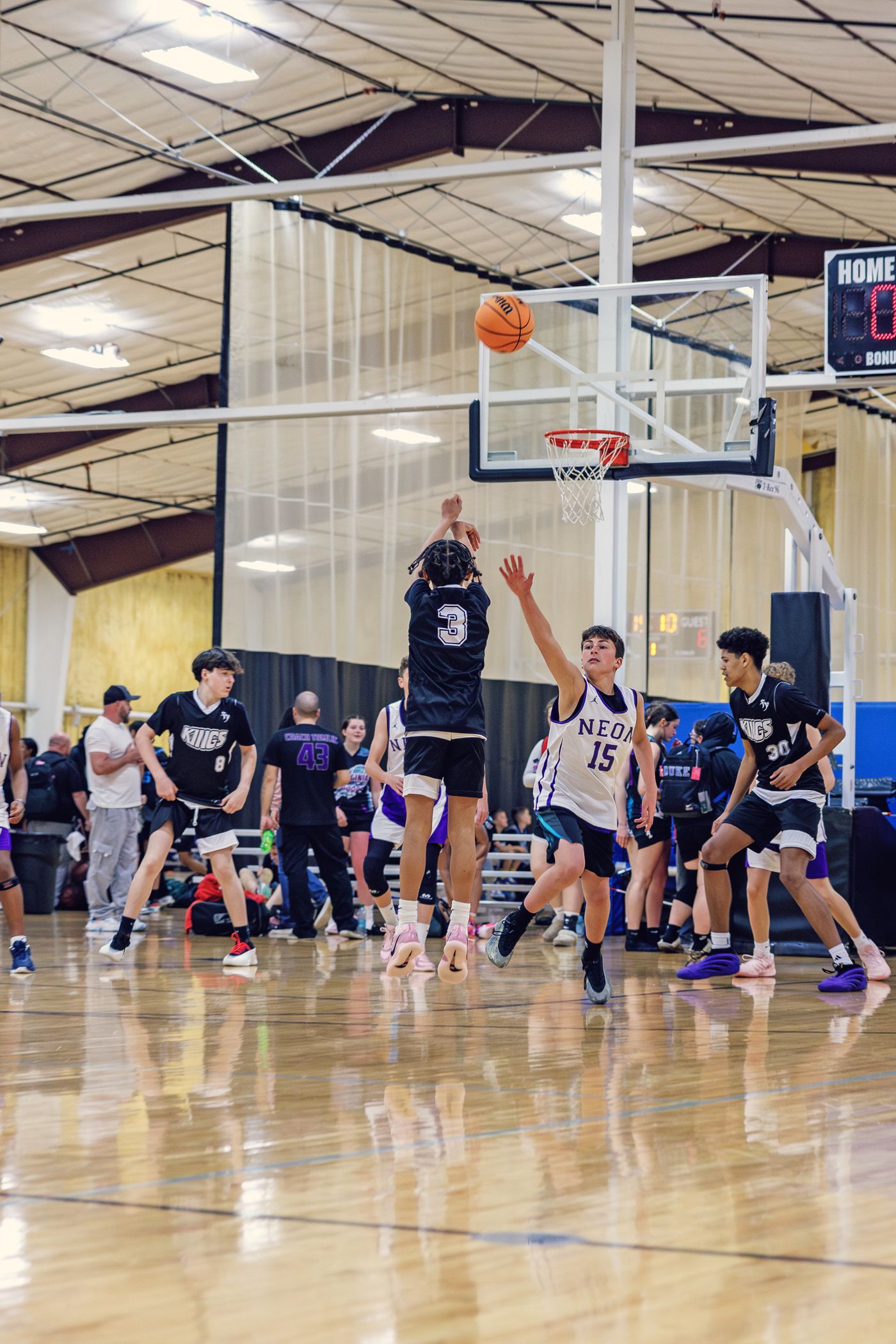 Kings player driving toward the basket.